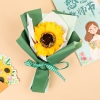 Bó hoa sáp hướng dương vàng bọc xanh