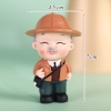 Tuong - Cụ ông đội mũ đeo cặp
