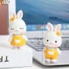 CV-Cặp Thỏ Trắng Áo Cam Nhựa Dẻo