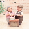 Tượng Ông Bà Làm Bánh Sứ