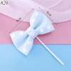 SCG - que cắm nơ chấm bi xanh