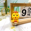 Rắn vàng đội mũ cầm bảng chữ TT