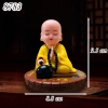 Tượng nhà sư lắc áo vàng đế tròn TQ