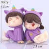 Tượng cặp đôi áo tím ngồi TQ