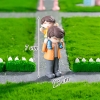 Tượng bố áo cam và con trai áo vàng TQ