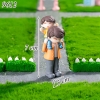 Tượng bố áo cam và con trai áo vàng TQ