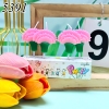 Vỉ 4 nến hoa cẩm chướng hồng TQ