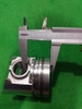 PISTON 4D95 ĐỈNH TÉP KẸP THÉP H104 IZ N ( ĐI XÉC MĂNG 1 VÁT )