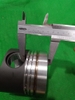 PISTON 6D16 IZUMI (N59 ẮC 38 THÂN ĐEN KẸP THÉP)