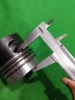 PISTON 4BD1/6BD1 nổ vuông đ.nhọn H112  ( CÓ KÈM XÉC MĂNG KONEKS XỊN)
