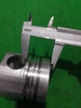 PISTON 6D105-1 NỔ VUÔNG   (MÁY ỦI) KẸP THÉP  IZUMI DL