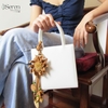 Charm hoa dã quỳ iSeren, da dê cao cấp, da thật handmade, móc khóa, charm treo túi xách, quà tặng cao cấp
