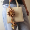 Charm hoa dã quỳ iSeren, da dê cao cấp, da thật handmade, móc khóa, charm treo túi xách, quà tặng cao cấp