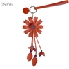 Charm hoa cúc iSeren, da dê cao cấp, da thật handmade, móc khóa, charm treo túi xách, quà tặng cao cấp