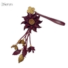 Charm hoa dã quỳ iSeren, da dê cao cấp, da thật handmade, móc khóa, charm treo túi xách, quà tặng cao cấp