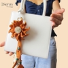 Charm hoa dã quỳ iSeren, da dê cao cấp, da thật handmade, móc khóa, charm treo túi xách, quà tặng cao cấp