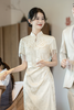Sườn xám ren phối gấm tua rua sang trọng_I74