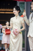 Sườn xám ren phối gấm tua rua sang trọng_I74