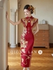 Sườn xám cưới đỏ thêu hoa văn vàng tua rua_I103