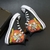 Giày Converse thấp cổ vải họa tiết looney tunes CCVH014