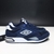 Giày Outlet Umbro thấp cổ da xanh UBTDX003